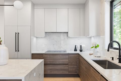 Photo of 12 Pennsylvania Ave #12, Newton, MA 02461 (MLS # 73473677)