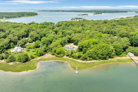 Photo of 233 Scraggy Neck Rd, Bourne, MA 02532 (MLS # 73544107)