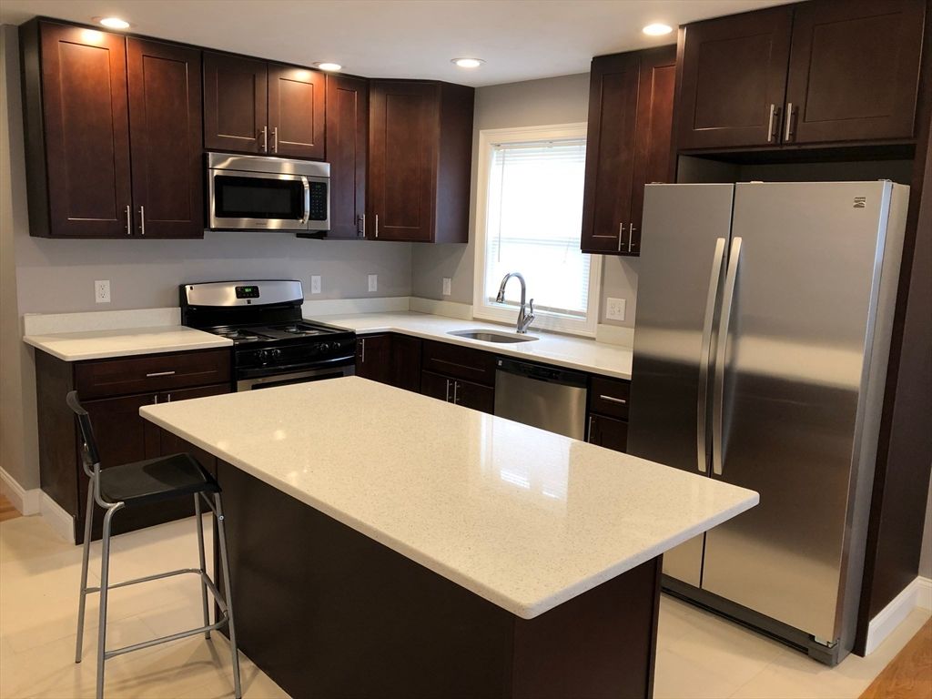 Photo of 12 Rockledge St #1, Boston, MA 02119 (MLS # 73444930)