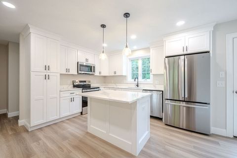 Photo of 33 Tainter Hill Rd #33B, Millbury, MA 01527 (MLS # 73441838)