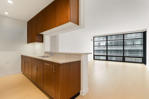 Photo of 580 Washington St #5F, Boston, MA 02111 (MLS # 73439918)