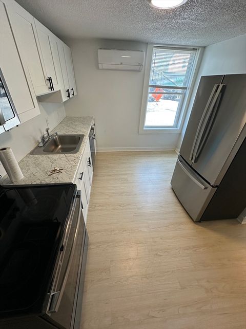 Photo of 124 Felton St #1, Waltham, MA 02453 (MLS # 73512864)