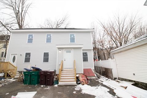 Photo of 58 Willow St, Lowell, MA 01852 (MLS # 73463308)