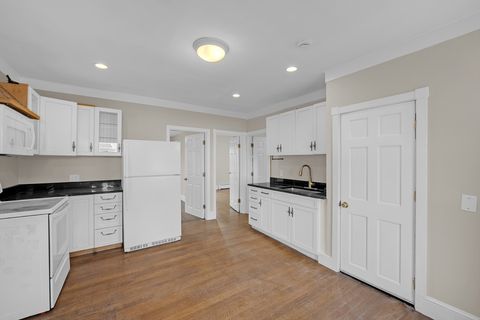 Photo of 130 Dalton St, Lowell, MA 01850 (MLS # 73457141)