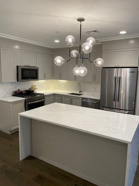 Photo of 214 Market St #206, Boston, MA 02135 (MLS # 73512134)