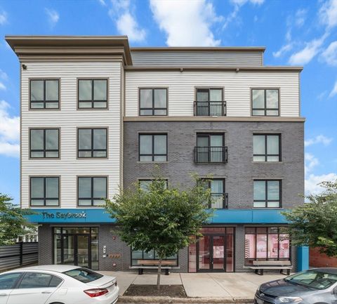 Photo of 214 Market St #208, Boston, MA 02135 (MLS # 73488653)