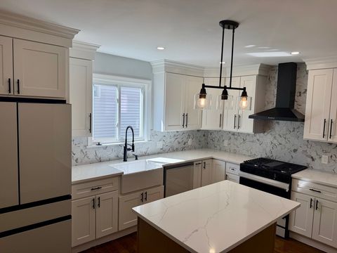 Photo of 60-62 Wellsmere Road #1, Boston, MA 02131 (MLS # 73526492)