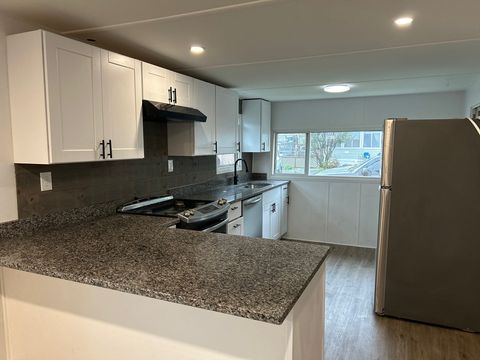 Photo of 50 Mustang Ave, Marlborough, MA 01752 (MLS # 73460852)