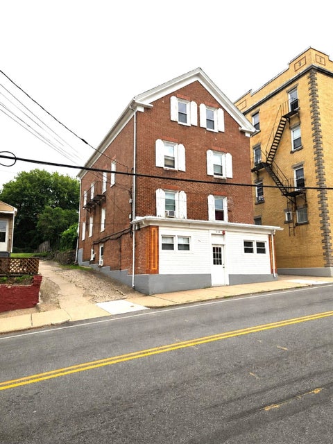 Photo of 588 East School St, Woonsocket, RI 02895 (MLS # 73580420)