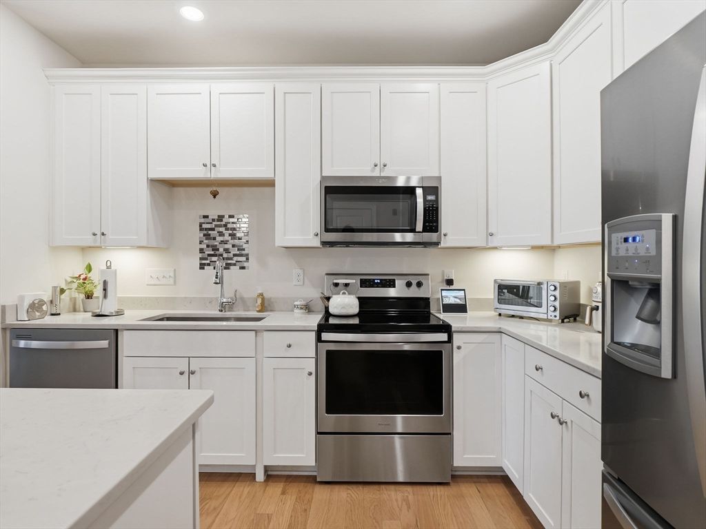 Photo of 220 Martins Landing #104, North Reading, MA 01864 (MLS # 73503399)