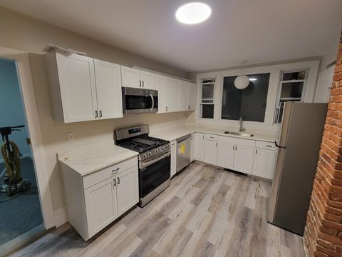 Photo of 96 Midland St #1, Lowell, MA 01851 (MLS # 73464434)