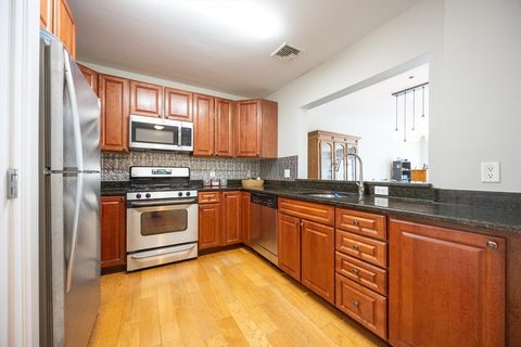 Photo of 5170 Washington St #107, Boston, MA 02132 (MLS # 73479356)