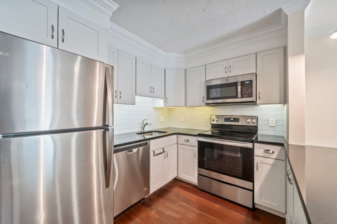 Photo of 152 Quincy Shore Dr #13, Quincy, MA 02171 (MLS # 73589788)