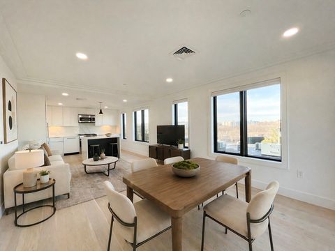 Photo of 50 Leo M. Birmingham Pkwy #409, Boston, MA 02135 (MLS # 73505068)