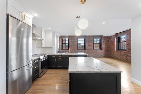 Photo of 1241-1245 Adams St #F406, Boston, MA 02124 (MLS # 73494141)