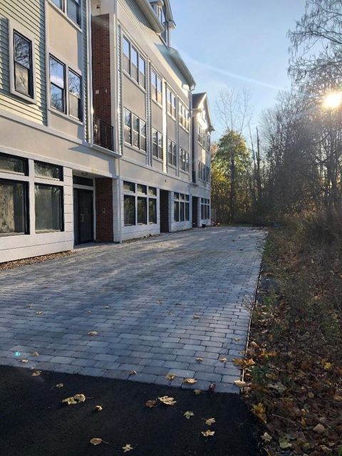 Photo of 59 Pleasant St #D, Randolph, MA 02368 (MLS # 73494224)