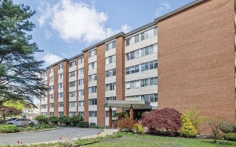 Photo of 22 Chestnut Pl #114, Brookline, MA 02445 (MLS # 73439712)