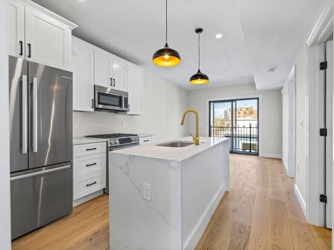 Photo of 48 Woodward St #3, Boston, MA 02127 (MLS # 73486608)