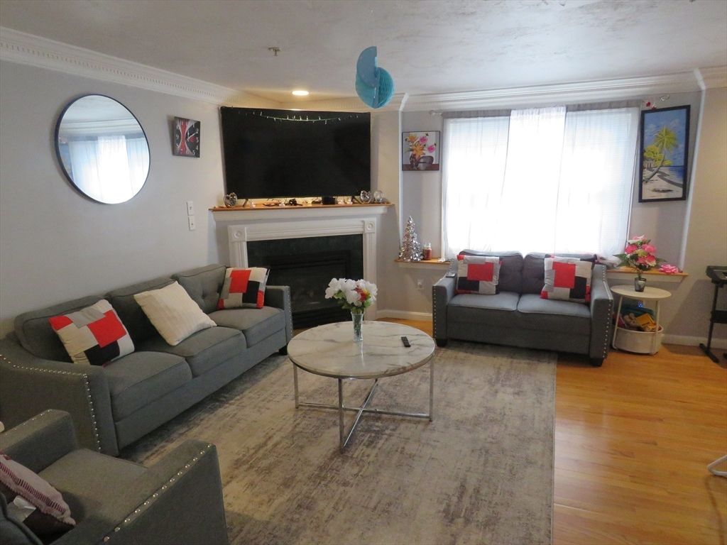 Photo of 446 Westford St #1, Lowell, MA 01851 (MLS # 73503181)