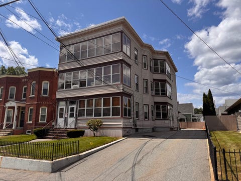 Photo of 102 Fourth Ave, Lowell, MA 01854 (MLS # 73563927)