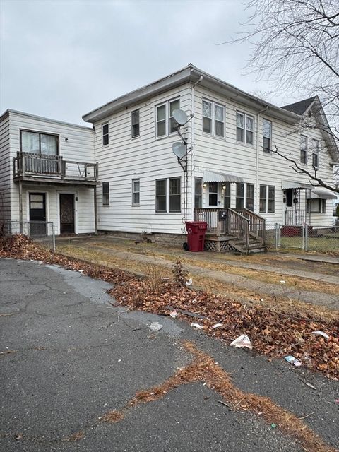 Photo of 89 Mammoth Rd, Lowell, MA 01854 (MLS # 73475068)
