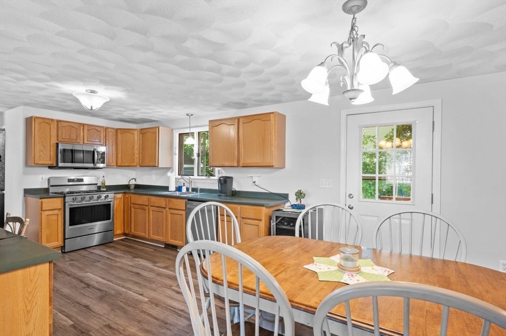 Photo of 11 Fleming St, Lowell, MA 01851 (MLS # 73555632)