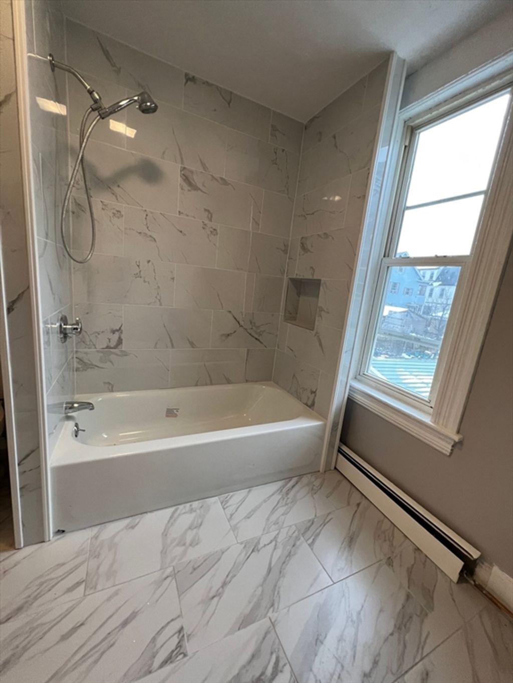 Photo of 14 Bellevue St #2, Lowell, MA 01851 (MLS # 73463925)