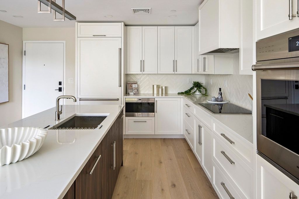 Photo of 20 Kinmonth Rd #201, Newton, MA 02468 (MLS # 73467929)