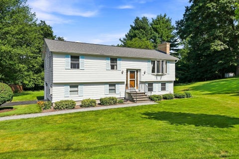 Photo of 19 Mcintosh Rd, Chelmsford, MA 01824 (MLS # 73563833)
