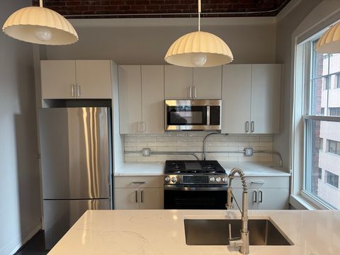 Photo of 281 Franklin St #603, Boston, MA 02110 (MLS # 73465854)