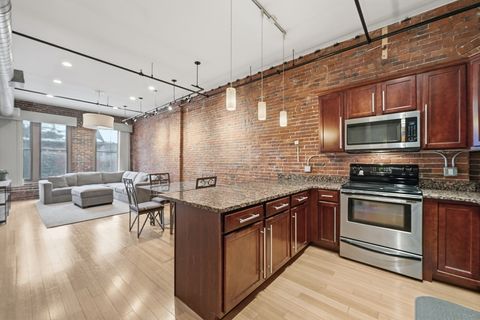 Photo of 61 Market St #3A, Lowell, MA 01852 (MLS # 73479575)