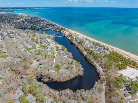 Photo of 21 Uncatena Rd, Mashpee, MA 02649 (MLS # 73515347)