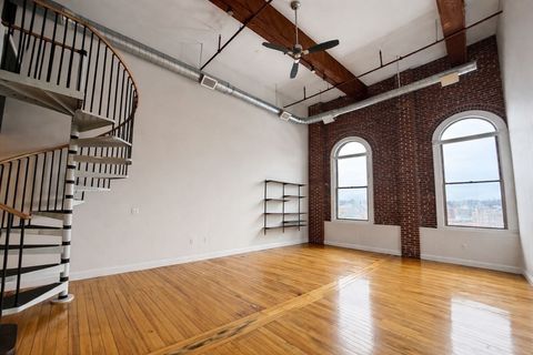 Photo of 10 Kearney Sq #407, Lowell, MA 01852 (MLS # 73478477)