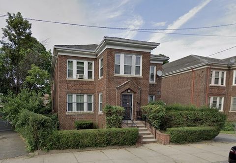 Photo of 55 Pasadena Rd, Boston, MA 02121 (MLS # 73511166)
