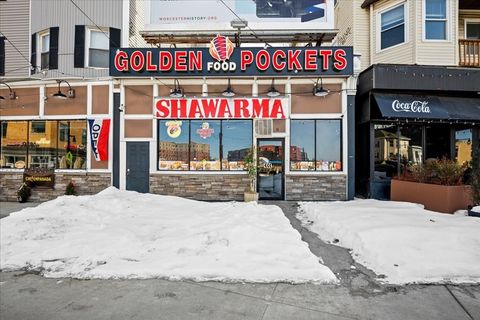 Photo of 9-11 Kelly Square, Worcester, MA 01604 (MLS # 73483443)