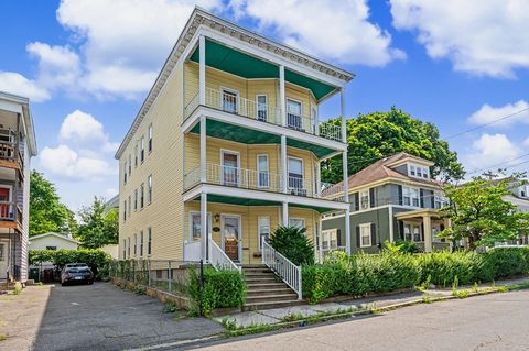 Photo of 9 Bourne St, Lowell, MA 01852 (MLS # 73555029)