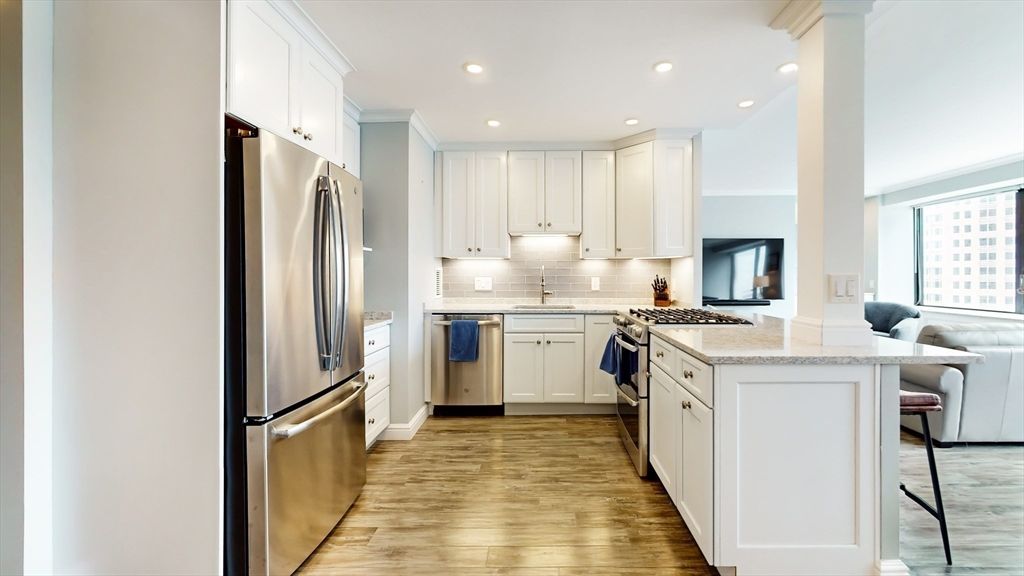 Photo of 65 E India Row #24H, Boston, MA 02110 (MLS # 73467842)