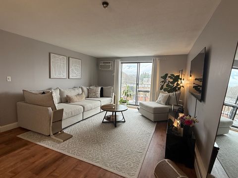 Photo of 145 Pleasant St #A403, Marlborough, MA 01752 (MLS # 73497381)