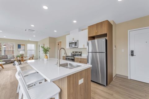 Photo of 375 Cummins Highway #301, Boston, MA 02131 (MLS # 73492502)