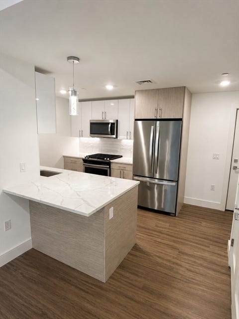 Photo of 386 Market St #206, Boston, MA 02135 (MLS # 73555399)