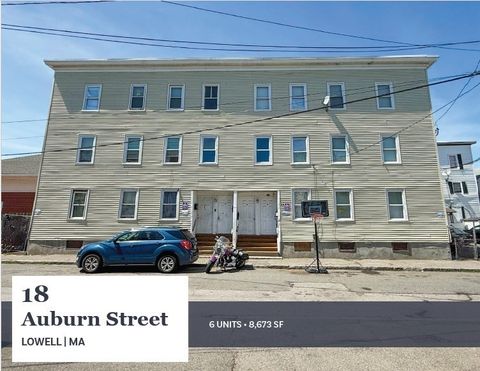 Photo of 18 Auburn St, Lowell, MA 01852 (MLS # 73543150)