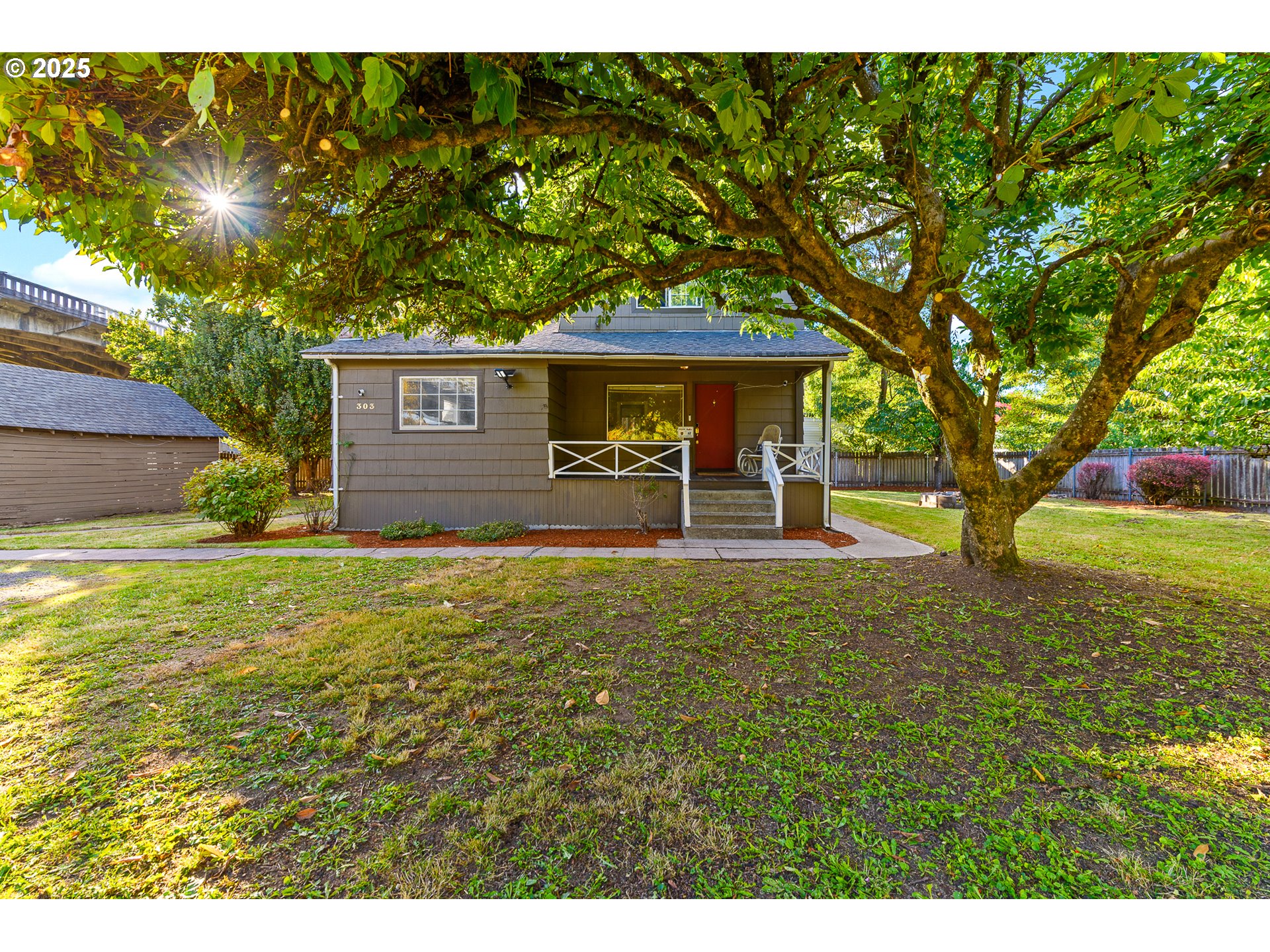 303 NW 1ST AVE