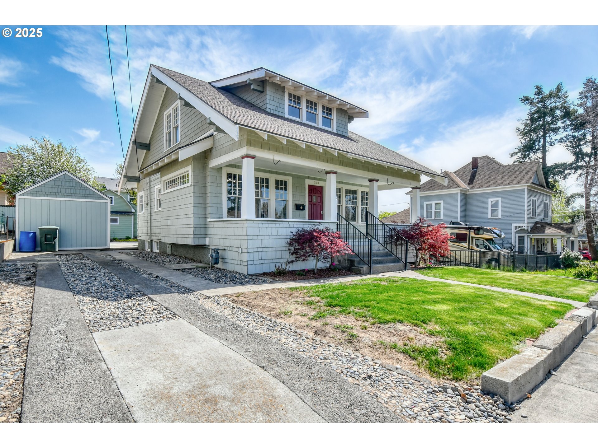 210 NW 7TH ST