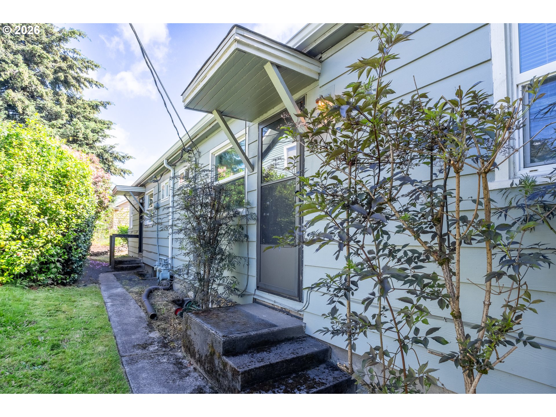 305 NE 26TH AVE