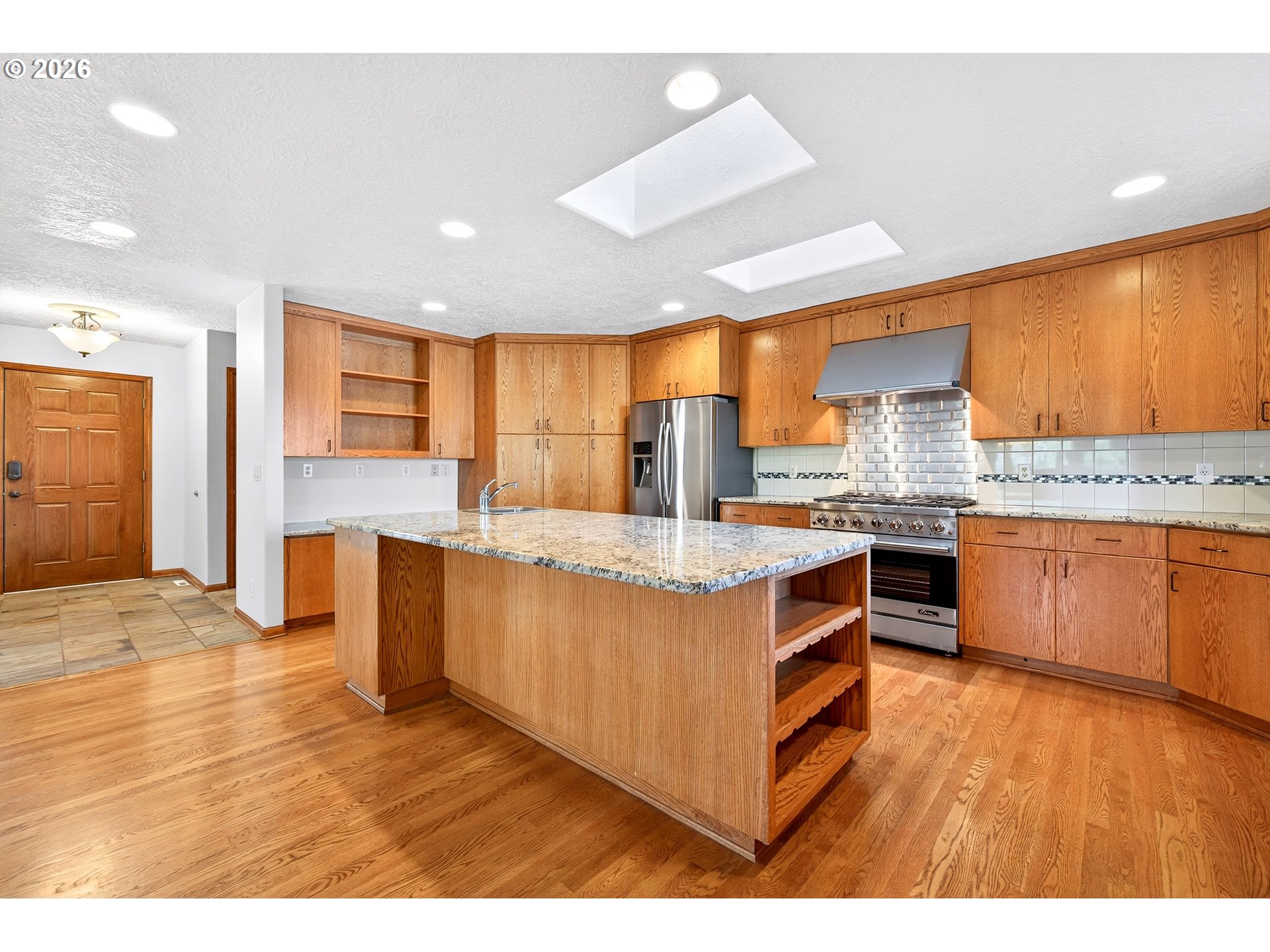 387 NE 15TH CT