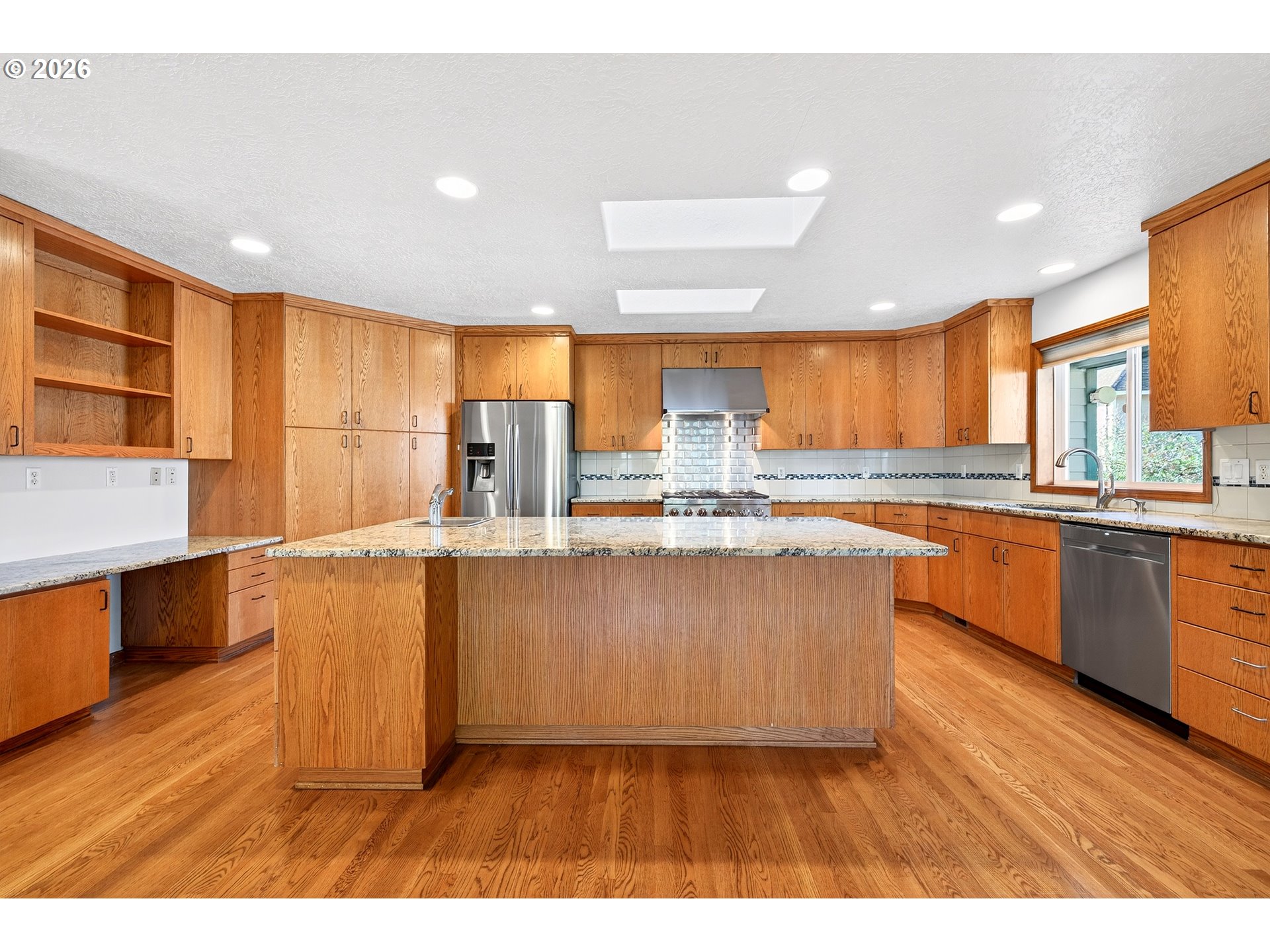 387 NE 15TH CT