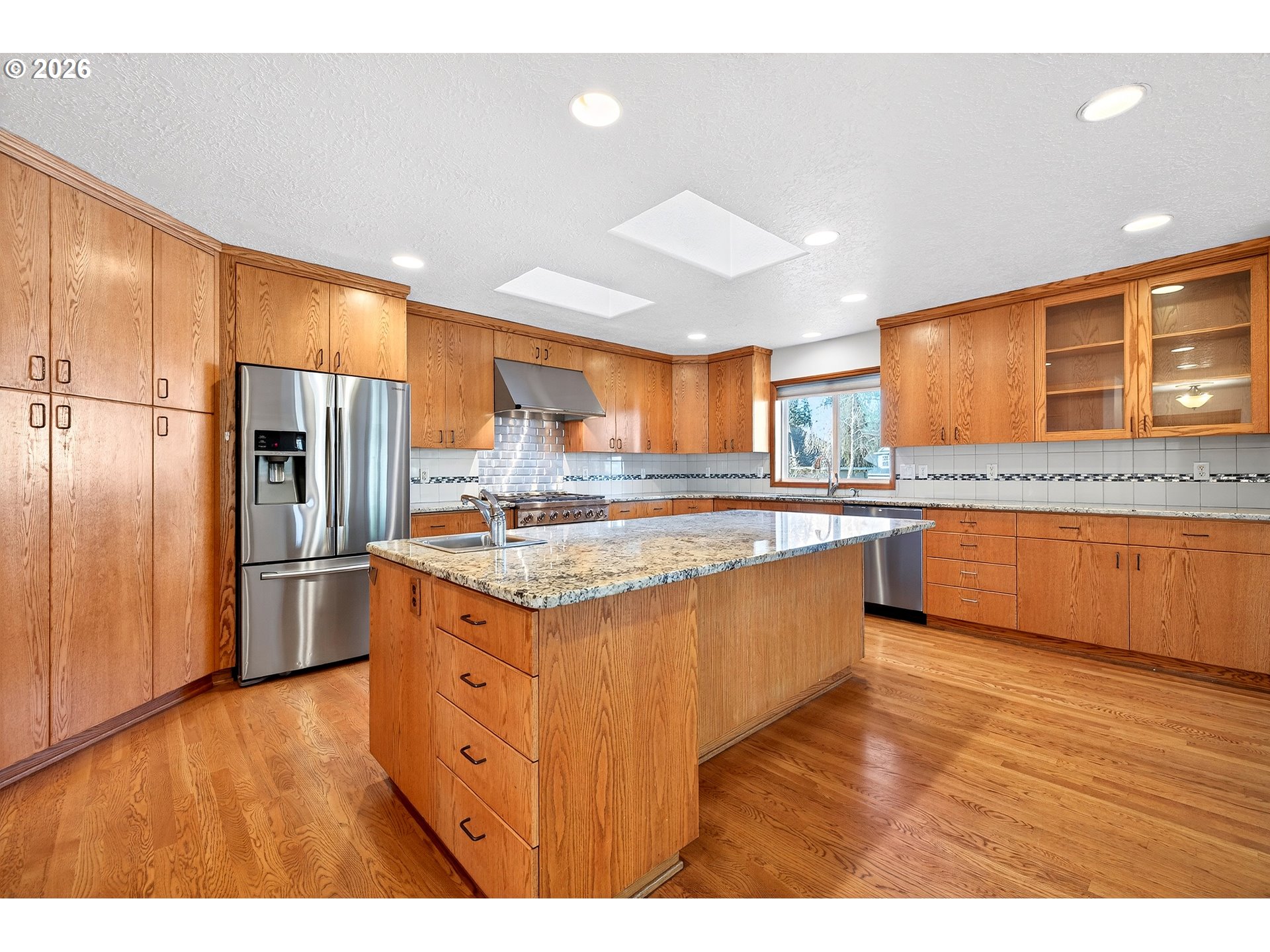 387 NE 15TH CT
