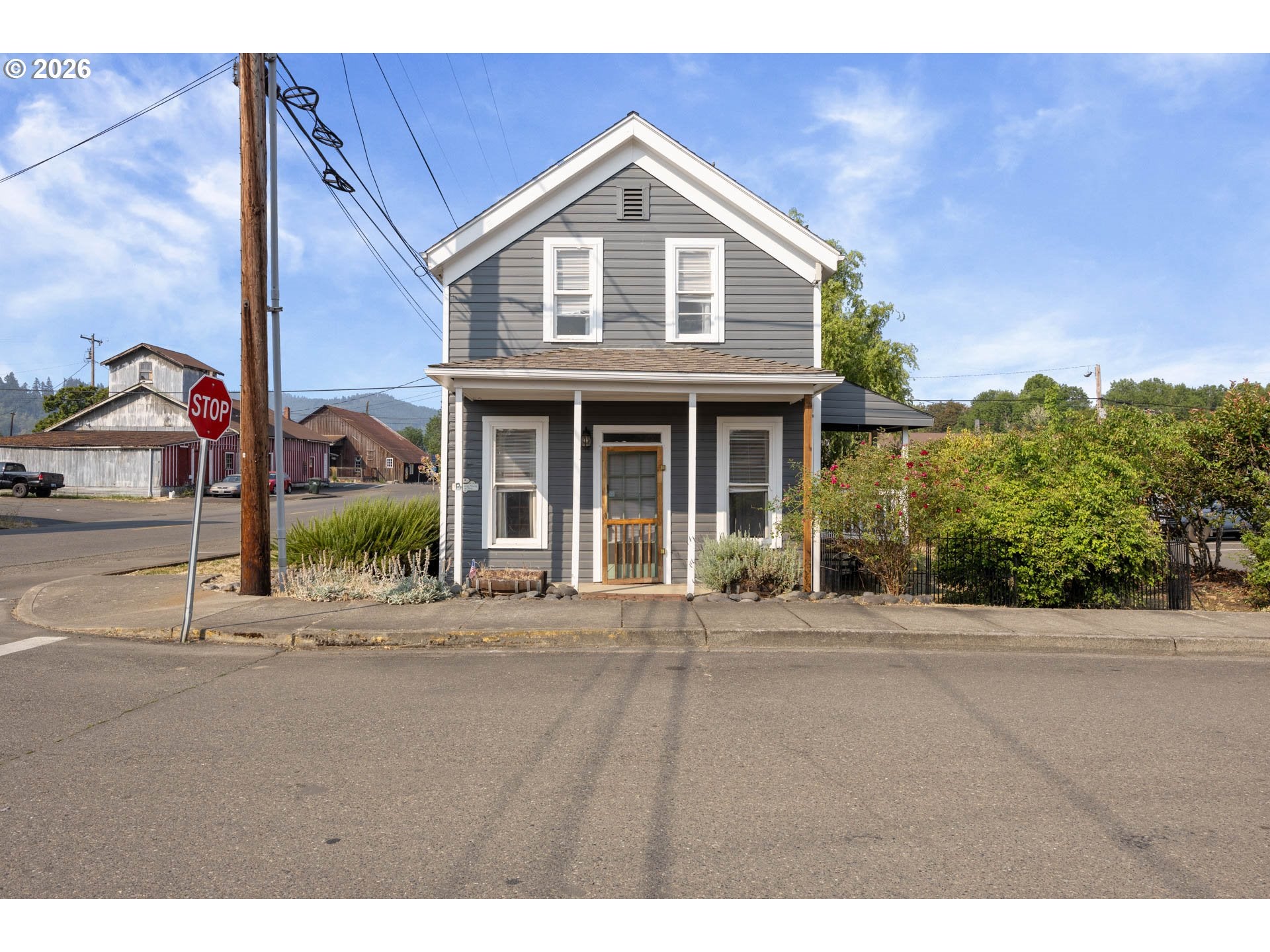 203 NE SECOND ST