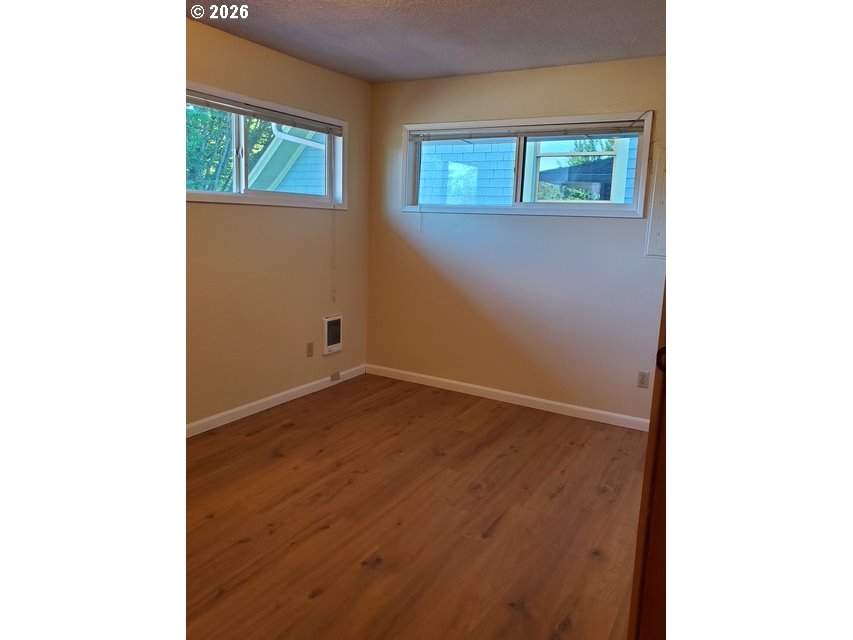 1607 NE 26TH AVE