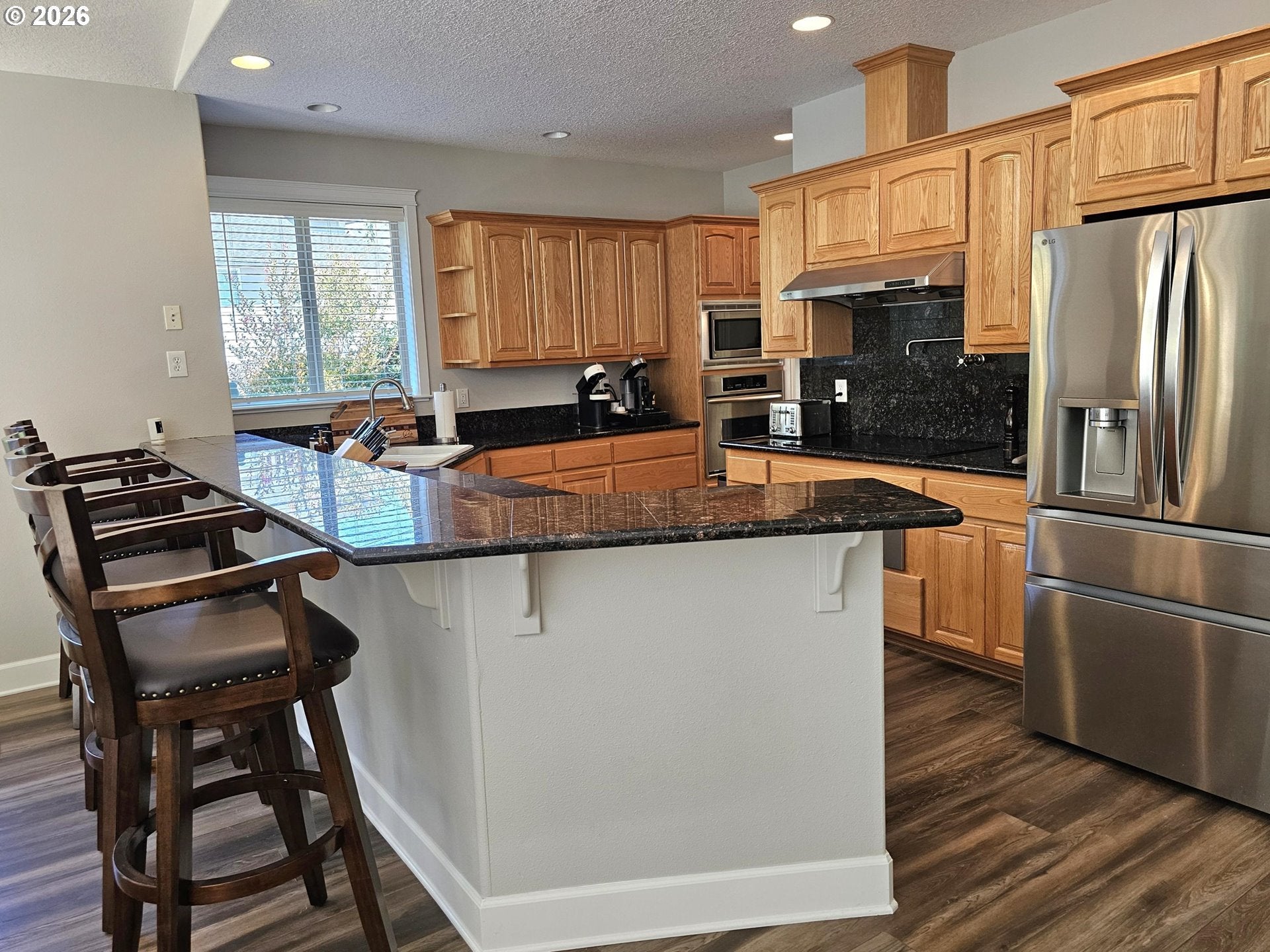 1395 NW WEST MEADOWS DR